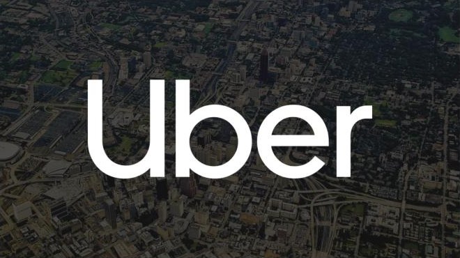 The Uber wordmark over an aerial view of Atlanta, the title slide of the team&rsquo;s deck